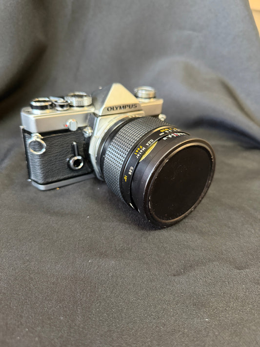 Olympus OM-1 Film Camera – Silver with 55mm Macro Lens