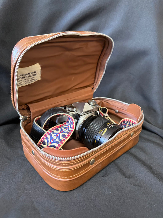 Olympus OM-1 Film Camera – Silver with 55mm Macro Lens